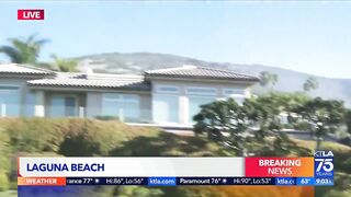 Evacuations remain as brush fire burns near Laguna Beach