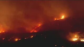 Wind-driven fire sparks in Laguna Beach