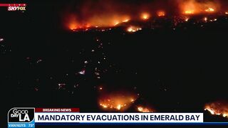 Wind-driven fire sparks in Laguna Beach