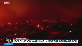 Wind-driven fire sparks in Laguna Beach