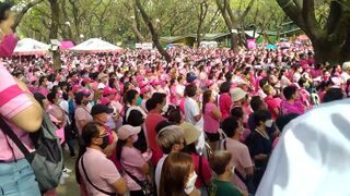 Celebrity singer Bituin Escalante sings the national anthem. The “Pink Sunday” Quezon City rally