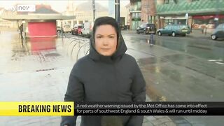 Storm Eunice: Sky correspondent gets hit by wave