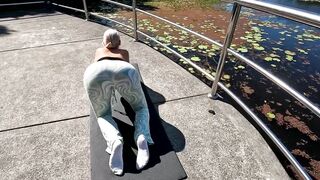 Relaxing yoga by the lake