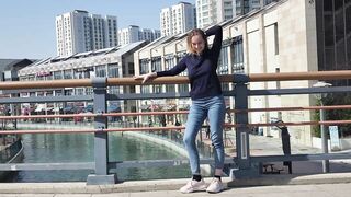 Stretching near river on the bridge