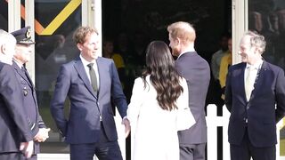 Meghan and Prince Harry arrive at the reception of the Invictus Games in The Hague | AFP