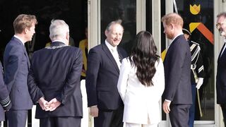 Meghan and Prince Harry arrive at the reception of the Invictus Games in The Hague | AFP