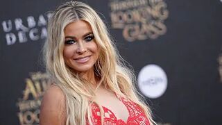 'Baywatch' star Carmen Electra celebrates 50th birthday in bright bikini