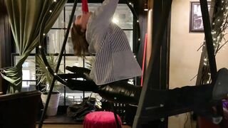 Contortion flexibility art performance. Stretching in a pub