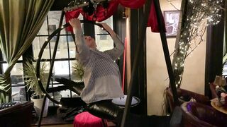 Contortion flexibility art performance. Stretching in a pub