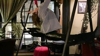 Contortion flexibility art performance. Stretching in a pub