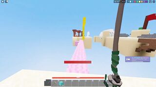 Dominating server with no armor and with a wooden sword in roblox bedwars