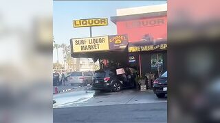 Sunset Beach crash. Almost hit my son & I, at a high rate of speed. Pushed a car into Surf Liquor.