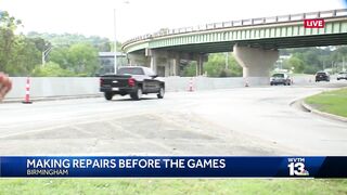 Making road repairs before the World Games