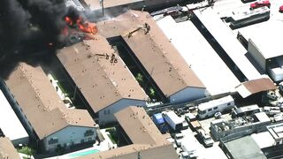 Fire erupts at Long Beach apartment building