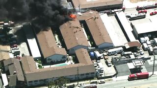 Fire erupts at Long Beach apartment building