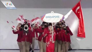 Team Singapore makes its entrance at the 31st SEA Games opening ceremony in Hanoi