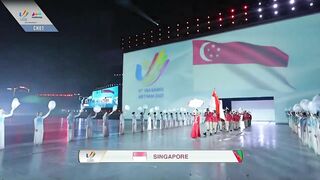 Team Singapore makes its entrance at the 31st SEA Games opening ceremony in Hanoi