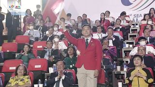 Team Singapore makes its entrance at the 31st SEA Games opening ceremony in Hanoi