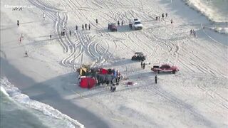 Sand hole at New Jersey beach collapses on siblings