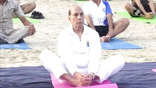 Rajnath Singh takes part in Yoga session with Indian Navy personnel at Karwar Naval Base