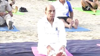 Rajnath Singh takes part in Yoga session with Indian Navy personnel at Karwar Naval Base