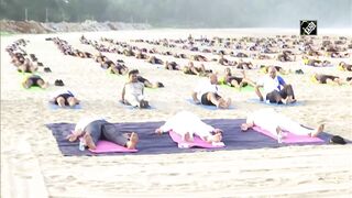 Rajnath Singh takes part in Yoga session with Indian Navy personnel at Karwar Naval Base