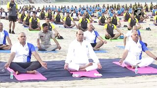 Rajnath Singh takes part in Yoga session with Indian Navy personnel at Karwar Naval Base