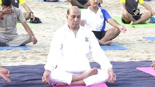 Rajnath Singh takes part in Yoga session with Indian Navy personnel at Karwar Naval Base