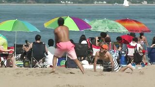 Beachgoers return to Orchard Beach for Memorial Day Weekend