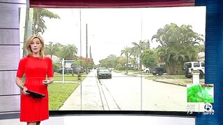 Neighbors stack sandbags, clear storm drains in Lake Worth Beach