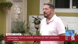 Neighbors stack sandbags, clear storm drains in Lake Worth Beach