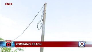 Tree snaps and falls on Pompano Beach mobile home during storm