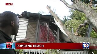 Tree snaps and falls on Pompano Beach mobile home during storm