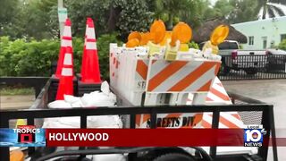 Hollywood Beach rescue vehicles help cars stuck in flooding