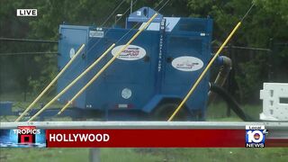 Hollywood Beach rescue vehicles help cars stuck in flooding