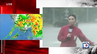 Hollywood Beach rescue vehicles help cars stuck in flooding