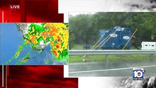 Hollywood Beach rescue vehicles help cars stuck in flooding