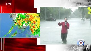 Hollywood Beach rescue vehicles help cars stuck in flooding