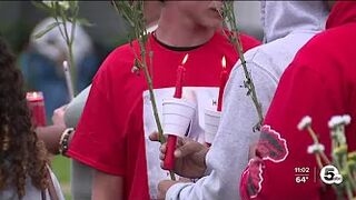 Families, strangers unite after drownings at Lorain beach