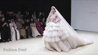 Models CAN'T WALK in huge wedding dresses during Maram Borhan Fall/Winter 2022-23 Fashion Show