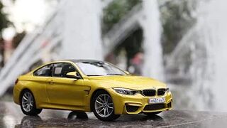 Bmw M4 F82 Paragon Models 1/18 and Polaris rzr xp 1/18 Die cast models fountain show.