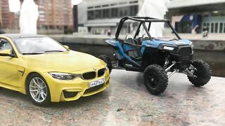 Bmw M4 F82 Paragon Models 1/18 and Polaris rzr xp 1/18 Die cast models fountain show.