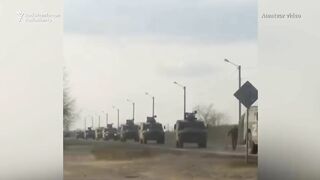 Man Tries To Stop Russian Military Convoy With His Bare Hands