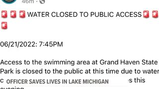 Off-duty officer jumps in to save lives at Grand Haven beach