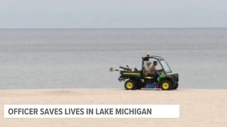 Off-duty officer jumps in to save lives at Grand Haven beach