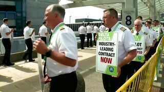 Off-duty Delta pilots picket outside MSP Airport ahead of busy travel weekend