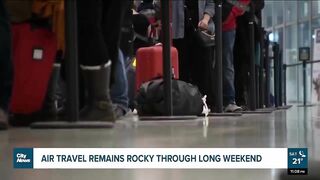 Air travel troubles continue into long weekend