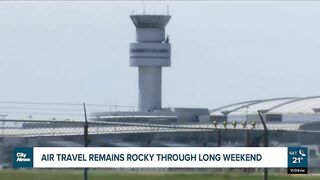 Air travel troubles continue into long weekend