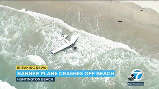 Horrified beachgoers watch as plane crashes into the ocean at Huntington Beach | ABC7