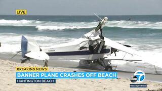 Horrified beachgoers watch as plane crashes into the ocean at Huntington Beach | ABC7